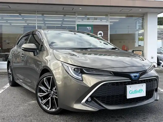 トヨタ カローラ スポーツ ハイブリッドG Z 三重県 2019(平31)年 5万km オキサイドブロンズM ワンオーナー /登録時走行距離４９７６０km/♪トヨタセーフティセンス/　・プリクラッシュセーフティ(PCS)/　・レーントレーシングアシスト(LTA)/　・ロードサインアシスト(RSA)/　・レーダークルーズコントロール(全車速追従機能付き)/　・ブラインドスポットモニター(BSM)/　・クリアランスソナー/　・パーキングサポートブレーキ(PKSB)/　・ドライブモードセレクトスイッチ/♪純正ナビ/　・Bluetooth・DTV・CD再生・AUX/♪バックガイドカメラ/♪スマートキーx２/♪プッシュスタート/♪LEDヘッドライト/♪LEDフォグライト/♪オートマチックハイビーム/♪オートライト/♪ドライブレコーダー/♪革巻きステアリング/♪ステアリングスイッチ/♪オートリトラクタブルミラー/♪ウィンカーミラー/♪電子パーキングブレーキ/♪オートブレーキホールド/♪充電用USBポート/♪ビルトインETC/♪ドアバイザー/♪プライバシーガラス/♪ライトレベリング/♪横滑り防止機能/♪サイド/カーテン/ニーエアバック