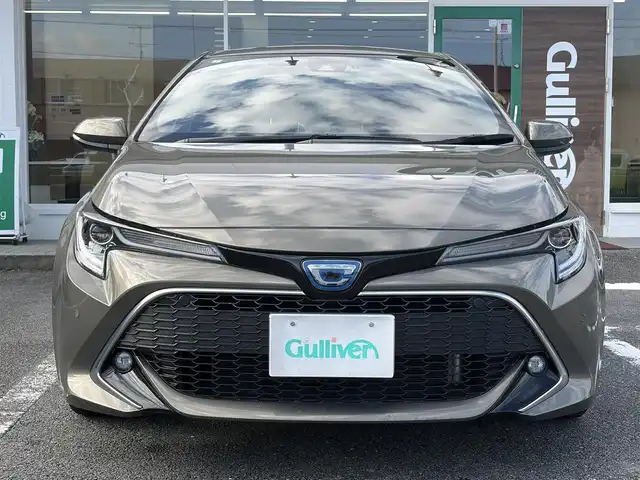 トヨタ カローラ スポーツ ハイブリッドG Z 三重県 2019(平31)年 5万km オキサイドブロンズM ワンオーナー /登録時走行距離４９７６０km/♪トヨタセーフティセンス/　・プリクラッシュセーフティ(PCS)/　・レーントレーシングアシスト(LTA)/　・ロードサインアシスト(RSA)/　・レーダークルーズコントロール(全車速追従機能付き)/　・ブラインドスポットモニター(BSM)/　・クリアランスソナー/　・パーキングサポートブレーキ(PKSB)/　・ドライブモードセレクトスイッチ/♪純正ナビ/　・Bluetooth・DTV・CD再生・AUX/♪バックガイドカメラ/♪スマートキーx２/♪プッシュスタート/♪LEDヘッドライト/♪LEDフォグライト/♪オートマチックハイビーム/♪オートライト/♪ドライブレコーダー/♪革巻きステアリング/♪ステアリングスイッチ/♪オートリトラクタブルミラー/♪ウィンカーミラー/♪電子パーキングブレーキ/♪オートブレーキホールド/♪充電用USBポート/♪ビルトインETC/♪ドアバイザー/♪プライバシーガラス/♪ライトレベリング/♪横滑り防止機能/♪サイド/カーテン/ニーエアバック