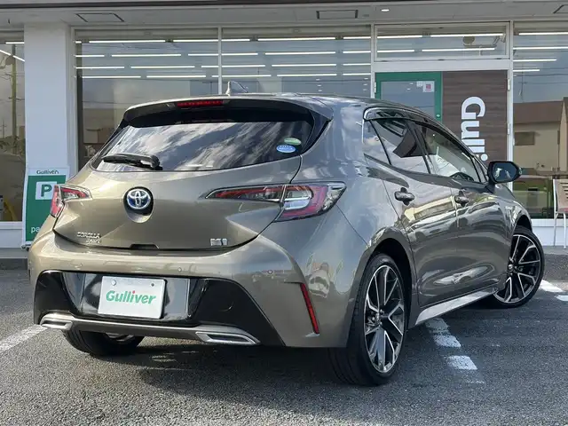 トヨタ カローラ スポーツ ハイブリッドG Z 三重県 2019(平31)年 5万km オキサイドブロンズM ワンオーナー /登録時走行距離４９７６０km/♪トヨタセーフティセンス/　・プリクラッシュセーフティ(PCS)/　・レーントレーシングアシスト(LTA)/　・ロードサインアシスト(RSA)/　・レーダークルーズコントロール(全車速追従機能付き)/　・ブラインドスポットモニター(BSM)/　・クリアランスソナー/　・パーキングサポートブレーキ(PKSB)/　・ドライブモードセレクトスイッチ/♪純正ナビ/　・Bluetooth・DTV・CD再生・AUX/♪バックガイドカメラ/♪スマートキーx２/♪プッシュスタート/♪LEDヘッドライト/♪LEDフォグライト/♪オートマチックハイビーム/♪オートライト/♪ドライブレコーダー/♪革巻きステアリング/♪ステアリングスイッチ/♪オートリトラクタブルミラー/♪ウィンカーミラー/♪電子パーキングブレーキ/♪オートブレーキホールド/♪充電用USBポート/♪ビルトインETC/♪ドアバイザー/♪プライバシーガラス/♪ライトレベリング/♪横滑り防止機能/♪サイド/カーテン/ニーエアバック