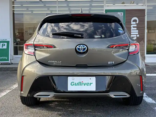 トヨタ カローラ スポーツ ハイブリッドG Z 三重県 2019(平31)年 5万km オキサイドブロンズM ワンオーナー /登録時走行距離４９７６０km/♪トヨタセーフティセンス/　・プリクラッシュセーフティ(PCS)/　・レーントレーシングアシスト(LTA)/　・ロードサインアシスト(RSA)/　・レーダークルーズコントロール(全車速追従機能付き)/　・ブラインドスポットモニター(BSM)/　・クリアランスソナー/　・パーキングサポートブレーキ(PKSB)/　・ドライブモードセレクトスイッチ/♪純正ナビ/　・Bluetooth・DTV・CD再生・AUX/♪バックガイドカメラ/♪スマートキーx２/♪プッシュスタート/♪LEDヘッドライト/♪LEDフォグライト/♪オートマチックハイビーム/♪オートライト/♪ドライブレコーダー/♪革巻きステアリング/♪ステアリングスイッチ/♪オートリトラクタブルミラー/♪ウィンカーミラー/♪電子パーキングブレーキ/♪オートブレーキホールド/♪充電用USBポート/♪ビルトインETC/♪ドアバイザー/♪プライバシーガラス/♪ライトレベリング/♪横滑り防止機能/♪サイド/カーテン/ニーエアバック
