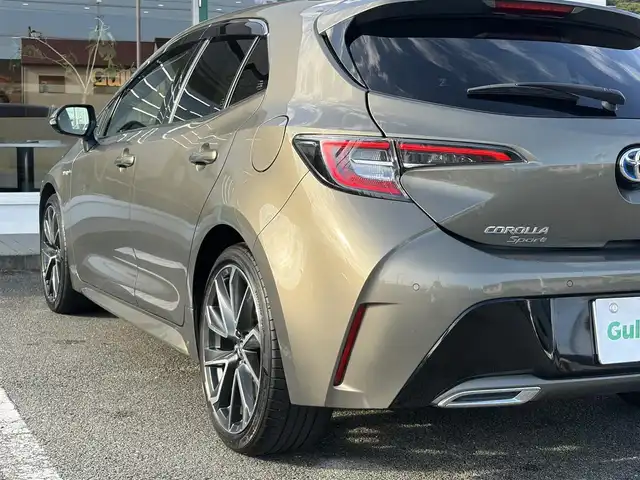 トヨタ カローラ スポーツ ハイブリッドG Z 三重県 2019(平31)年 5万km オキサイドブロンズM ワンオーナー /登録時走行距離４９７６０km/♪トヨタセーフティセンス/　・プリクラッシュセーフティ(PCS)/　・レーントレーシングアシスト(LTA)/　・ロードサインアシスト(RSA)/　・レーダークルーズコントロール(全車速追従機能付き)/　・ブラインドスポットモニター(BSM)/　・クリアランスソナー/　・パーキングサポートブレーキ(PKSB)/　・ドライブモードセレクトスイッチ/♪純正ナビ/　・Bluetooth・DTV・CD再生・AUX/♪バックガイドカメラ/♪スマートキーx２/♪プッシュスタート/♪LEDヘッドライト/♪LEDフォグライト/♪オートマチックハイビーム/♪オートライト/♪ドライブレコーダー/♪革巻きステアリング/♪ステアリングスイッチ/♪オートリトラクタブルミラー/♪ウィンカーミラー/♪電子パーキングブレーキ/♪オートブレーキホールド/♪充電用USBポート/♪ビルトインETC/♪ドアバイザー/♪プライバシーガラス/♪ライトレベリング/♪横滑り防止機能/♪サイド/カーテン/ニーエアバック