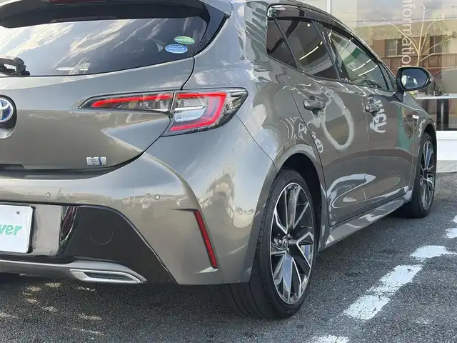 トヨタ カローラ スポーツ ハイブリッドG Z 三重県 2019(平31)年 5万km オキサイドブロンズM ワンオーナー /登録時走行距離４９７６０km/♪トヨタセーフティセンス/　・プリクラッシュセーフティ(PCS)/　・レーントレーシングアシスト(LTA)/　・ロードサインアシスト(RSA)/　・レーダークルーズコントロール(全車速追従機能付き)/　・ブラインドスポットモニター(BSM)/　・クリアランスソナー/　・パーキングサポートブレーキ(PKSB)/　・ドライブモードセレクトスイッチ/♪純正ナビ/　・Bluetooth・DTV・CD再生・AUX/♪バックガイドカメラ/♪スマートキーx２/♪プッシュスタート/♪LEDヘッドライト/♪LEDフォグライト/♪オートマチックハイビーム/♪オートライト/♪ドライブレコーダー/♪革巻きステアリング/♪ステアリングスイッチ/♪オートリトラクタブルミラー/♪ウィンカーミラー/♪電子パーキングブレーキ/♪オートブレーキホールド/♪充電用USBポート/♪ビルトインETC/♪ドアバイザー/♪プライバシーガラス/♪ライトレベリング/♪横滑り防止機能/♪サイド/カーテン/ニーエアバック