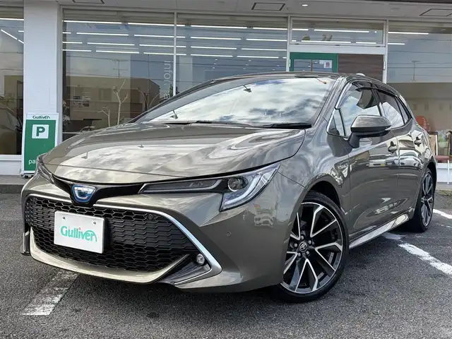 トヨタ カローラ スポーツ ハイブリッドG Z 三重県 2019(平31)年 5万km オキサイドブロンズM ワンオーナー /登録時走行距離４９７６０km/♪トヨタセーフティセンス/　・プリクラッシュセーフティ(PCS)/　・レーントレーシングアシスト(LTA)/　・ロードサインアシスト(RSA)/　・レーダークルーズコントロール(全車速追従機能付き)/　・ブラインドスポットモニター(BSM)/　・クリアランスソナー/　・パーキングサポートブレーキ(PKSB)/　・ドライブモードセレクトスイッチ/♪純正ナビ/　・Bluetooth・DTV・CD再生・AUX/♪バックガイドカメラ/♪スマートキーx２/♪プッシュスタート/♪LEDヘッドライト/♪LEDフォグライト/♪オートマチックハイビーム/♪オートライト/♪ドライブレコーダー/♪革巻きステアリング/♪ステアリングスイッチ/♪オートリトラクタブルミラー/♪ウィンカーミラー/♪電子パーキングブレーキ/♪オートブレーキホールド/♪充電用USBポート/♪ビルトインETC/♪ドアバイザー/♪プライバシーガラス/♪ライトレベリング/♪横滑り防止機能/♪サイド/カーテン/ニーエアバック