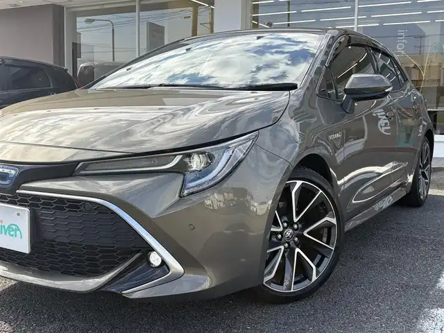 トヨタ カローラ スポーツ ハイブリッドG Z 三重県 2019(平31)年 5万km オキサイドブロンズM ワンオーナー /登録時走行距離４９７６０km/♪トヨタセーフティセンス/　・プリクラッシュセーフティ(PCS)/　・レーントレーシングアシスト(LTA)/　・ロードサインアシスト(RSA)/　・レーダークルーズコントロール(全車速追従機能付き)/　・ブラインドスポットモニター(BSM)/　・クリアランスソナー/　・パーキングサポートブレーキ(PKSB)/　・ドライブモードセレクトスイッチ/♪純正ナビ/　・Bluetooth・DTV・CD再生・AUX/♪バックガイドカメラ/♪スマートキーx２/♪プッシュスタート/♪LEDヘッドライト/♪LEDフォグライト/♪オートマチックハイビーム/♪オートライト/♪ドライブレコーダー/♪革巻きステアリング/♪ステアリングスイッチ/♪オートリトラクタブルミラー/♪ウィンカーミラー/♪電子パーキングブレーキ/♪オートブレーキホールド/♪充電用USBポート/♪ビルトインETC/♪ドアバイザー/♪プライバシーガラス/♪ライトレベリング/♪横滑り防止機能/♪サイド/カーテン/ニーエアバック