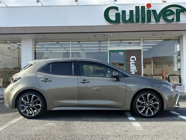 トヨタ カローラ スポーツ ハイブリッドG Z 三重県 2019(平31)年 5万km オキサイドブロンズM ワンオーナー /登録時走行距離４９７６０km/♪トヨタセーフティセンス/　・プリクラッシュセーフティ(PCS)/　・レーントレーシングアシスト(LTA)/　・ロードサインアシスト(RSA)/　・レーダークルーズコントロール(全車速追従機能付き)/　・ブラインドスポットモニター(BSM)/　・クリアランスソナー/　・パーキングサポートブレーキ(PKSB)/　・ドライブモードセレクトスイッチ/♪純正ナビ/　・Bluetooth・DTV・CD再生・AUX/♪バックガイドカメラ/♪スマートキーx２/♪プッシュスタート/♪LEDヘッドライト/♪LEDフォグライト/♪オートマチックハイビーム/♪オートライト/♪ドライブレコーダー/♪革巻きステアリング/♪ステアリングスイッチ/♪オートリトラクタブルミラー/♪ウィンカーミラー/♪電子パーキングブレーキ/♪オートブレーキホールド/♪充電用USBポート/♪ビルトインETC/♪ドアバイザー/♪プライバシーガラス/♪ライトレベリング/♪横滑り防止機能/♪サイド/カーテン/ニーエアバック