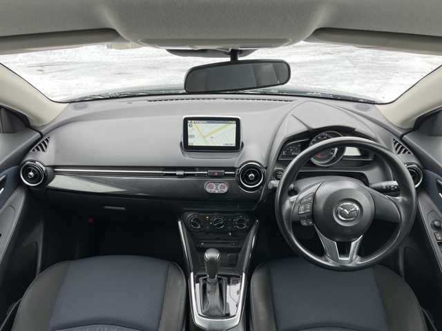 マツダ デミオ XD 道央・札幌 2015(平27)年 9.6万km メテオグレーマイカ 4WD/ワンオーナー/純正メモリーナビ/AM/FM/BT/SD/CD/DVD/フルセグ/衝突被害軽減ブレーキ/横滑り防止装置/バックカメラ/アイドリングストップ/ステアリングリモコン/MTモード付AT/プッシュスタート/スマートキー/ハロゲンヘッドライト/ヘッドライトレベライザー/電動格納ミラー/社外フロアマット/ドアバイザー