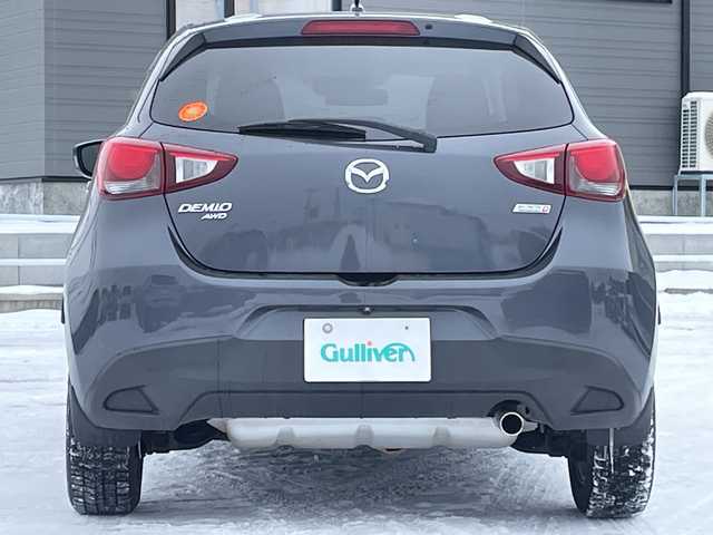 マツダ デミオ XD 道央・札幌 2015(平27)年 9.6万km メテオグレーマイカ 4WD/ワンオーナー/純正メモリーナビ/AM/FM/BT/SD/CD/DVD/フルセグ/衝突被害軽減ブレーキ/横滑り防止装置/バックカメラ/アイドリングストップ/ステアリングリモコン/MTモード付AT/プッシュスタート/スマートキー/ハロゲンヘッドライト/ヘッドライトレベライザー/電動格納ミラー/社外フロアマット/ドアバイザー