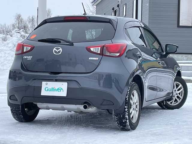 マツダ デミオ XD 道央・札幌 2015(平27)年 9.6万km メテオグレーマイカ 4WD/ワンオーナー/純正メモリーナビ/AM/FM/BT/SD/CD/DVD/フルセグ/衝突被害軽減ブレーキ/横滑り防止装置/バックカメラ/アイドリングストップ/ステアリングリモコン/MTモード付AT/プッシュスタート/スマートキー/ハロゲンヘッドライト/ヘッドライトレベライザー/電動格納ミラー/社外フロアマット/ドアバイザー