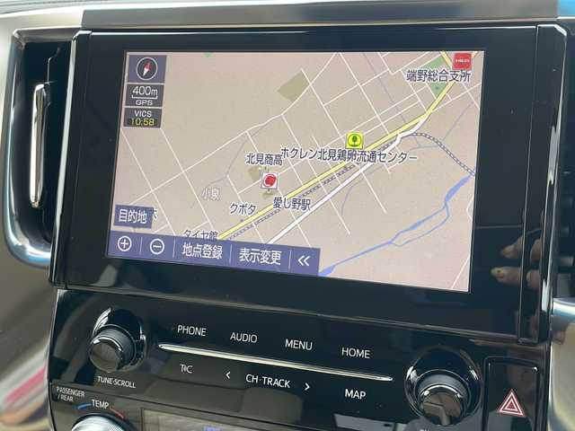 トヨタ アルファードハイブリット X 道東・釧路十勝 2020(令2)年 7.7万km ホワイトパールクリスタルシャイン ・４WD/・純正9インチディスプレイオーディオ/（AM・FM・CD・DVD・USB・BT・フルセグ・Miracast）/・バックカメラ/・純正12.1インチフリップダウンモニター/・両側パワースライドドア/・クルーズコントロール/・社外前後ドライブレコーダー/・白線逸脱防止機能/・オートマチックハイビーム/・オートブレーキホールド/・横滑り防止装置/・セカンドシートオットマン/・革巻きステアリング/・LEDヘッドライト/・LEDフォグライト/・純正フロアマット/・純正ドアバイザー/・ビルトインETC2.0/・純正16インチアルミホイール/・ディーラーオプションスペアタイヤ積み込み/・保証書/・取扱説明書