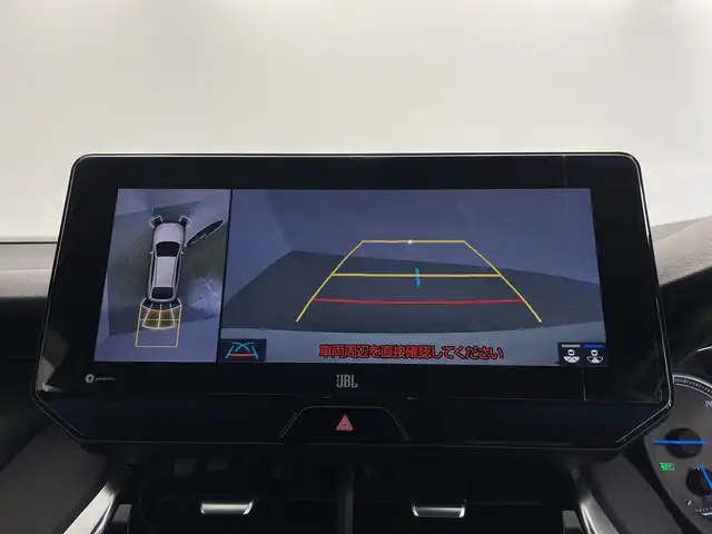 トヨタ ハリアー ハイブリッド Z レザーパッケージ 鹿児島県 2022(令4)年 4.7万km ホワイトパールクリスタルシャイン 純正12.3インチナビ/（AM/FM/Bluetooth/フルセグTV)/全方位カメラ/JBLプレミアムサウンド/AC100V電源/ヘッドアップディスプレイ/トヨタセーフティセンス/・衝突軽減ブレーキ/・レーンキープアシスト/・オートマチックハイビーム/・追従式クルーズコントロール/・クリアランスソナー/・誤発進抑制機能/ブラインドスポットモニター/ETC2.0/レザーシート/シートヒーター/シートベンチレーション/パワーシート/ステアリングヒーター/パワーバックドア/純正19インチアルミホイール/スマートキー/純正フロアマット/横滑り防止装置