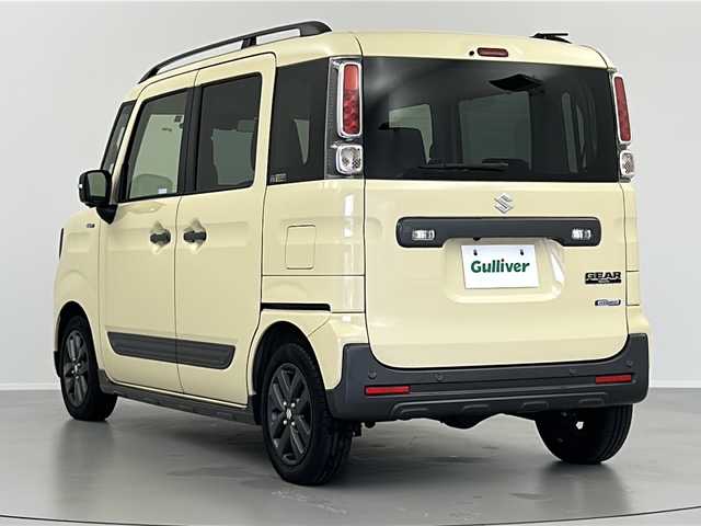 スズキ スペーシア ギア HYBRID XZ 福島県 2022(令4)年 1.5万km シフォンアイボリーM /禁煙車//4WD//スズキセーフティサポート/・後退時ブレーキサポート/・車線逸脱抑制制御機能/・車線逸脱警報機能/・パーキングソナー/・横滑り防止装置/・ハイビームアシスト//デュアルカメラブレーキサポート//ヘッドアップディスプレイ//アダプティブクルーズコントロール//全周囲カメラ//メーカーOPナビ/・BT.USB.CD.DVD/・フルセグTV//両側パワースライドドア//前席シートヒーター//ビルトインETC//ドライブレコーダー（FR）//プッシュスタート//スマートキー×2//LEDヘッドライト//LEDフォグライト//ステアリングスイッチ//純正フロアマット//純正14インチAW//シートバックテーブル//ロールサンシェード//後席サーキュレーター