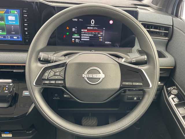 日産 サクラ X 90周年記念車 愛知県 2024(令6)年 0.7万km ライトブルー 純正9型ディスプレイオーディオ　ナビ機能なし/全方位カメラ/バックカメラ/コーナーセンサー/純正アルミホイール/LEDヘッドライト/オートマチックハイビーム/ドライブレコーダー/ETC/ワイヤレス充電機/衝突軽減システム/Bluetooth/ステアリングスイッチ/スマートキー/プッシュスタート