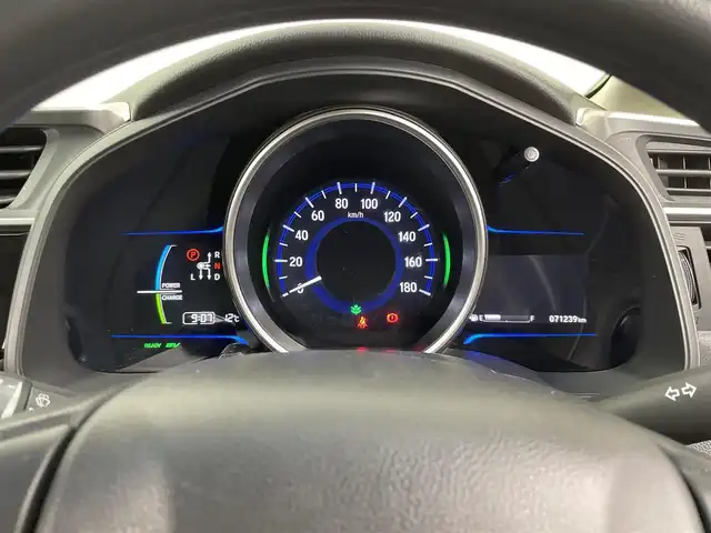 ホンダ フィット ハイブリット Fパッケージ コンフォートED 大分県 2016(平28)年 7.2万km プレミアムクリスタルレッドM ワンオーナー/純正SDナビ（VXM-175VFi）/ BT/CD/DVD/フルセグ/バックカメラ/シートヒーター（前席）/クルーズコントロール/オートライト/アイドリングストップ/ステアリングスイッチ/電動格納ミラー/ビルトインETC/プッシュスタート/スマートキー/純正フロアマット