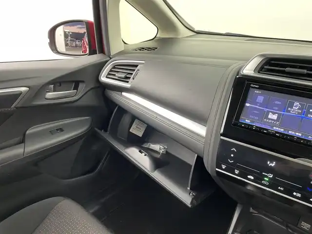 ホンダ フィット ハイブリット Fパッケージ コンフォートED 大分県 2016(平28)年 7.2万km プレミアムクリスタルレッドM ワンオーナー/純正SDナビ（VXM-175VFi）/ BT/CD/DVD/フルセグ/バックカメラ/シートヒーター（前席）/クルーズコントロール/オートライト/アイドリングストップ/ステアリングスイッチ/電動格納ミラー/ビルトインETC/プッシュスタート/スマートキー/純正フロアマット