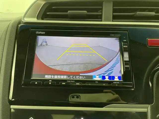 ホンダ フィット ハイブリット Fパッケージ コンフォートED 大分県 2016(平28)年 7.2万km プレミアムクリスタルレッドM ワンオーナー/純正SDナビ（VXM-175VFi）/ BT/CD/DVD/フルセグ/バックカメラ/シートヒーター（前席）/クルーズコントロール/オートライト/アイドリングストップ/ステアリングスイッチ/電動格納ミラー/ビルトインETC/プッシュスタート/スマートキー/純正フロアマット