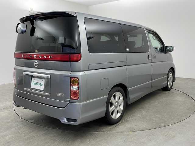 日産 エルグランド ハイウェイスター 兵庫県 2006(平18)年 10.3万km スパークリングシルバー ・社外HDDナビ/・ワンセグテレビ/・CD/MD再生/・バックカメラ/・AACエアコン/・ETC/・ハーフレザーシート/・片側パワースライドドア/・オートライト/・AFS/・HIDヘッドライト/・社外フロアマット/・純正アルミホイール/・三列シート/・Wエアバック/・リモコンキー/・ABS/・MTモード付AT
