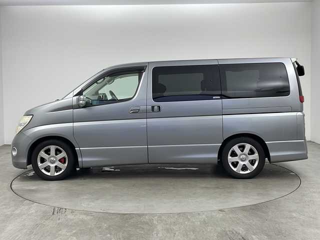 日産 エルグランド ハイウェイスター 兵庫県 2006(平18)年 10.3万km スパークリングシルバー ・社外HDDナビ/・ワンセグテレビ/・CD/MD再生/・バックカメラ/・AACエアコン/・ETC/・ハーフレザーシート/・片側パワースライドドア/・オートライト/・AFS/・HIDヘッドライト/・社外フロアマット/・純正アルミホイール/・三列シート/・Wエアバック/・リモコンキー/・ABS/・MTモード付AT