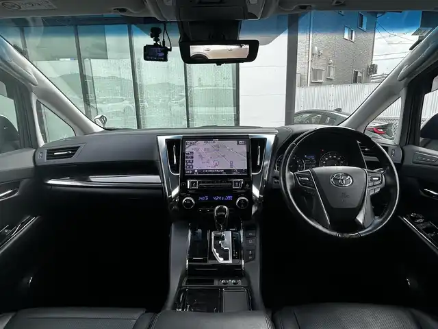 トヨタ アルファード S Cパッケージ 香川県 2019(令1)年 5.1万km ホワイトパールクリスタルシャイン 登録時走行距離：50982km/アルパイン11型ナビ/　CD DVD BT フルセグTV/バックカメラ　左サイドカメラ/アルパインフリップダウンモニター/Wサンルーフ/モデリスタエアロ（フロント　サイド　リアアンダー）/両側パワースライドドア/パワーバックドア/プリクラッシュセーフティシステム/レーンキープアシスト/レーダークルーズコントロール/ブラインドスポットモニター/クリアランスソナー/オートハイビーム/LEDヘッドライト/オートライト/フォグランプ/デジタルインナーミラー/前後ドライブレコーダー/ビルトインETC/レザーシート/シートベンチレーション/パワーシート/シートメモリ/オットマン/ステアリングヒーター/プッシュスタート/スマートキー/スペアキー