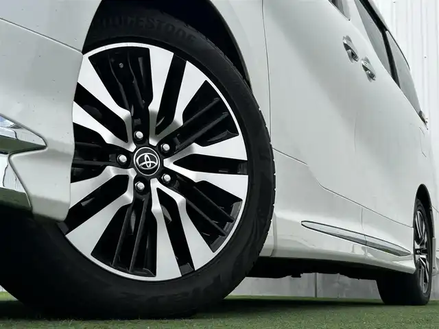 トヨタ アルファード S Cパッケージ 香川県 2019(令1)年 5.1万km ホワイトパールクリスタルシャイン 登録時走行距離：50982km/アルパイン11型ナビ/　CD DVD BT フルセグTV/バックカメラ　左サイドカメラ/アルパインフリップダウンモニター/Wサンルーフ/モデリスタエアロ（フロント　サイド　リアアンダー）/両側パワースライドドア/パワーバックドア/プリクラッシュセーフティシステム/レーンキープアシスト/レーダークルーズコントロール/ブラインドスポットモニター/クリアランスソナー/オートハイビーム/LEDヘッドライト/オートライト/フォグランプ/デジタルインナーミラー/前後ドライブレコーダー/ビルトインETC/レザーシート/シートベンチレーション/パワーシート/シートメモリ/オットマン/ステアリングヒーター/プッシュスタート/スマートキー/スペアキー