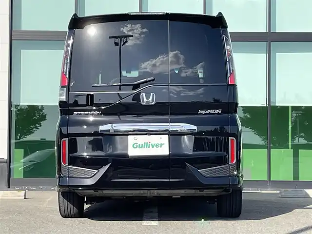 ホンダ ステップワゴン スパーダ ホンダセンシング 和歌山県 2021(令3)年 4.1万km プレミアムスパークルブラックパール 純正ナビ/バックカメラ/フルセグTV/BT/CD/DVD/衝突軽減ブレーキ/レーンキープアシスト/クルーズコントロール/オートライト/わくわくゲート/フリップダウンモニター/ドラレコ/ビルトインETC2.0/両側パワスラ/パドルシフト/LEDヘッドライト/フォグランプ/純正フロアマット/純正アルミ