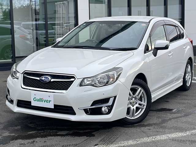 スバル インプレッサ スポーツ 1．6i－S アイサイト 道東・釧路十勝 2016(平28)年 7.6万km クリスタルホワイトP ・４WD/・純正ダイアトーンサウンドナビ/（BT・CD・DVD・ラジオ・フルセグ）/・バックカメラ/・アイサイト/・衝突被害軽減ブレーキ/・白線逸脱防止機能/・横滑り防止装置/・アイドリングストップ/・ドアバイザー/・ウィンカーミラー/・電動格納ミラー/・フォグライト/・レータークルーズコントロール/・純正ドライブレコーダー/・ハーフレザーシート/・オートライト/・純正16インチアルミホイール付夏タイヤ積込