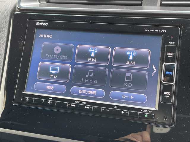 ホンダ フィット ハイブリット S ホンダセンシング 愛媛県 2018(平30)年 7.4万km シャイニンググレーM 純正ナビ/バックカメラ/衝突軽減システム/ビルトインETC/ドライブレコーダー前後/フルセグTV/クルーズコントロール追従あり/オートLED/レーンキープアシスト/横滑り防止装置/純正16AW/純正フロアマット/スペアキー1本/Bluetooth