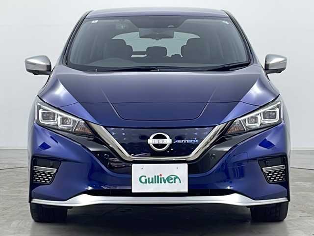 日産 リーフ e+ オーテック 道央・札幌 2021(令3)年 2万km オーロラフレアブルーパール ・ワンオーナー/・プロパイロット/・純正ナビ/（BT&USB&HDMI&フルセグ&AppleCarPlay）/・全方位モニター/・エマージェンシーブレーキ/・側方支援/・後側方支援/・道路標識表示/・レーダークルーズ/・BSM/・純正デジタルインナーミラー/・レーダークルーズコントロール/・ステアリングヒーター/・全席シートヒーター/・社外ドライブレコーダー（前方）/・ステアリングスイッチ/・ビルトインETC/・フロント、サイド、バックカメラ/・LEDヘッドライト/・RAYS１８インチAW/・純正AW付き冬タイヤ積み込み