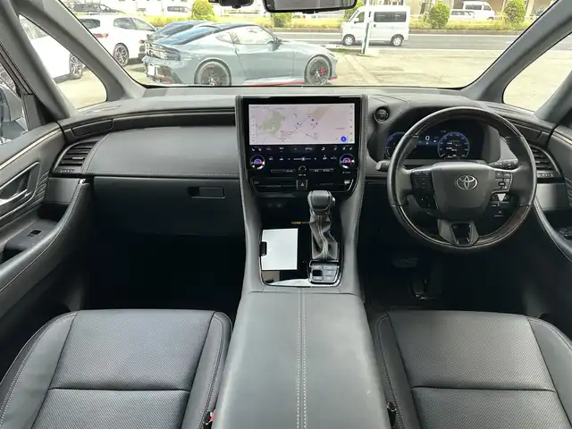 トヨタ アルファードハイブリット Z 三重県 2024(令6)年 3.6万km ゴールド ワンオーナー/ムーンルーフ/♪トヨタセーフティセンス/　・プリクラッシュセーフティシステム(PCS)/　・レーダークルーズコントロール/　・プロアクティブドライビングアシスト( PDA)/　・レーントテーシングアシスト( LTA)/   ・レーンディパーチャーアラート(LDA)/　・ブラインドスポットモニター(BSM)/　・ドライブスタートコントロール/♪純正メーカー14インチディスプレイナビ/　・フルセグ・Bluetooth・USB/　・MiraCast・HDMI/♪純正13.2インチ有機EL後席ディスプレイ/♪パノラミックビューモニター/♪純正デジタルインナーミラー/♪純正ドライブレコーダー(前後・360°)/♪前席・後席パワーシート(D席メモリ機能付き)/♪前席・後席(シートヒーター・ベンチレーション)/♪スマートキーx2/♪プッシュスタート/♪両側パワースライドドア/♪パワーバックドア/♪クリアランスソナー/♪三眼 LEDヘッドライト/♪LEDフォグライト/♪オートハイビーム/♪オートブレーキホールド/♪オートリトラクタブルミラー/♪後席電動オットマン/♪後席電動サンシェード/♪AC100V/♪ビルトインETC2.0/♪フロアマット/♪ドアバイザー