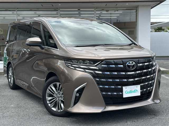 トヨタ アルファードハイブリット Z 三重県 2024(令6)年 3.6万km ゴールド ワンオーナー/ムーンルーフ/♪トヨタセーフティセンス/　・プリクラッシュセーフティシステム(PCS)/　・レーダークルーズコントロール/　・プロアクティブドライビングアシスト( PDA)/　・レーントテーシングアシスト( LTA)/   ・レーンディパーチャーアラート(LDA)/　・ブラインドスポットモニター(BSM)/　・ドライブスタートコントロール/♪純正メーカー14インチディスプレイナビ/　・フルセグ・Bluetooth・USB/　・MiraCast・HDMI/♪純正13.2インチ有機EL後席ディスプレイ/♪パノラミックビューモニター/♪純正デジタルインナーミラー/♪純正ドライブレコーダー(前後・360°)/♪前席・後席パワーシート(D席メモリ機能付き)/♪前席・後席(シートヒーター・ベンチレーション)/♪スマートキーx2/♪プッシュスタート/♪両側パワースライドドア/♪パワーバックドア/♪クリアランスソナー/♪三眼 LEDヘッドライト/♪LEDフォグライト/♪オートハイビーム/♪オートブレーキホールド/♪オートリトラクタブルミラー/♪後席電動オットマン/♪後席電動サンシェード/♪AC100V/♪ビルトインETC2.0/♪フロアマット/♪ドアバイザー