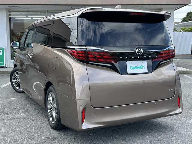 トヨタ アルファードハイブリット Z 三重県 2024(令6)年 3.6万km ゴールド ワンオーナー/ムーンルーフ/♪トヨタセーフティセンス/　・プリクラッシュセーフティシステム(PCS)/　・レーダークルーズコントロール/　・プロアクティブドライビングアシスト( PDA)/　・レーントテーシングアシスト( LTA)/   ・レーンディパーチャーアラート(LDA)/　・ブラインドスポットモニター(BSM)/　・ドライブスタートコントロール/♪純正メーカー14インチディスプレイナビ/　・フルセグ・Bluetooth・USB/　・MiraCast・HDMI/♪純正13.2インチ有機EL後席ディスプレイ/♪パノラミックビューモニター/♪純正デジタルインナーミラー/♪純正ドライブレコーダー(前後・360°)/♪前席・後席パワーシート(D席メモリ機能付き)/♪前席・後席(シートヒーター・ベンチレーション)/♪スマートキーx2/♪プッシュスタート/♪両側パワースライドドア/♪パワーバックドア/♪クリアランスソナー/♪三眼 LEDヘッドライト/♪LEDフォグライト/♪オートハイビーム/♪オートブレーキホールド/♪オートリトラクタブルミラー/♪後席電動オットマン/♪後席電動サンシェード/♪AC100V/♪ビルトインETC2.0/♪フロアマット/♪ドアバイザー