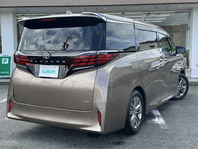 トヨタ アルファードハイブリット Z 三重県 2024(令6)年 3.6万km ゴールド ワンオーナー/ムーンルーフ/♪トヨタセーフティセンス/　・プリクラッシュセーフティシステム(PCS)/　・レーダークルーズコントロール/　・プロアクティブドライビングアシスト( PDA)/　・レーントテーシングアシスト( LTA)/   ・レーンディパーチャーアラート(LDA)/　・ブラインドスポットモニター(BSM)/　・ドライブスタートコントロール/♪純正メーカー14インチディスプレイナビ/　・フルセグ・Bluetooth・USB/　・MiraCast・HDMI/♪純正13.2インチ有機EL後席ディスプレイ/♪パノラミックビューモニター/♪純正デジタルインナーミラー/♪純正ドライブレコーダー(前後・360°)/♪前席・後席パワーシート(D席メモリ機能付き)/♪前席・後席(シートヒーター・ベンチレーション)/♪スマートキーx2/♪プッシュスタート/♪両側パワースライドドア/♪パワーバックドア/♪クリアランスソナー/♪三眼 LEDヘッドライト/♪LEDフォグライト/♪オートハイビーム/♪オートブレーキホールド/♪オートリトラクタブルミラー/♪後席電動オットマン/♪後席電動サンシェード/♪AC100V/♪ビルトインETC2.0/♪フロアマット/♪ドアバイザー