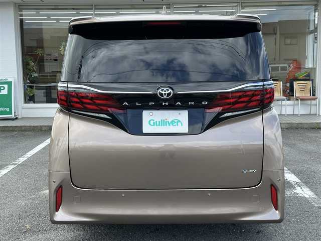 トヨタ アルファードハイブリット Z 三重県 2024(令6)年 3.6万km ゴールド ワンオーナー/ムーンルーフ/♪トヨタセーフティセンス/　・プリクラッシュセーフティシステム(PCS)/　・レーダークルーズコントロール/　・プロアクティブドライビングアシスト( PDA)/　・レーントテーシングアシスト( LTA)/   ・レーンディパーチャーアラート(LDA)/　・ブラインドスポットモニター(BSM)/　・ドライブスタートコントロール/♪純正メーカー14インチディスプレイナビ/　・フルセグ・Bluetooth・USB/　・MiraCast・HDMI/♪純正13.2インチ有機EL後席ディスプレイ/♪パノラミックビューモニター/♪純正デジタルインナーミラー/♪純正ドライブレコーダー(前後・360°)/♪前席・後席パワーシート(D席メモリ機能付き)/♪前席・後席(シートヒーター・ベンチレーション)/♪スマートキーx2/♪プッシュスタート/♪両側パワースライドドア/♪パワーバックドア/♪クリアランスソナー/♪三眼 LEDヘッドライト/♪LEDフォグライト/♪オートハイビーム/♪オートブレーキホールド/♪オートリトラクタブルミラー/♪後席電動オットマン/♪後席電動サンシェード/♪AC100V/♪ビルトインETC2.0/♪フロアマット/♪ドアバイザー