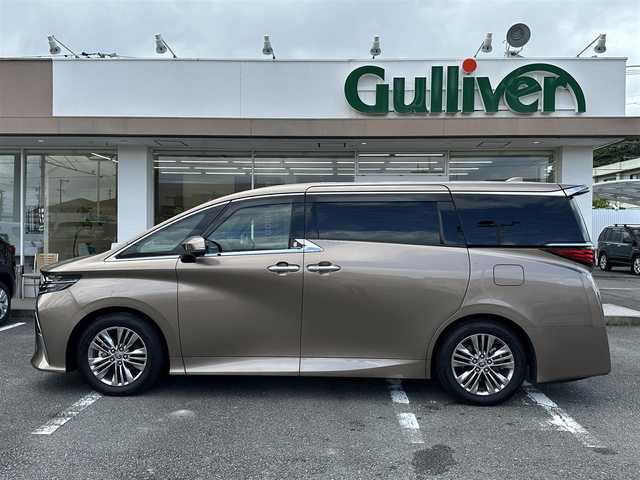 トヨタ アルファードハイブリット Z 三重県 2024(令6)年 3.6万km ゴールド ワンオーナー/ムーンルーフ/♪トヨタセーフティセンス/　・プリクラッシュセーフティシステム(PCS)/　・レーダークルーズコントロール/　・プロアクティブドライビングアシスト( PDA)/　・レーントテーシングアシスト( LTA)/   ・レーンディパーチャーアラート(LDA)/　・ブラインドスポットモニター(BSM)/　・ドライブスタートコントロール/♪純正メーカー14インチディスプレイナビ/　・フルセグ・Bluetooth・USB/　・MiraCast・HDMI/♪純正13.2インチ有機EL後席ディスプレイ/♪パノラミックビューモニター/♪純正デジタルインナーミラー/♪純正ドライブレコーダー(前後・360°)/♪前席・後席パワーシート(D席メモリ機能付き)/♪前席・後席(シートヒーター・ベンチレーション)/♪スマートキーx2/♪プッシュスタート/♪両側パワースライドドア/♪パワーバックドア/♪クリアランスソナー/♪三眼 LEDヘッドライト/♪LEDフォグライト/♪オートハイビーム/♪オートブレーキホールド/♪オートリトラクタブルミラー/♪後席電動オットマン/♪後席電動サンシェード/♪AC100V/♪ビルトインETC2.0/♪フロアマット/♪ドアバイザー