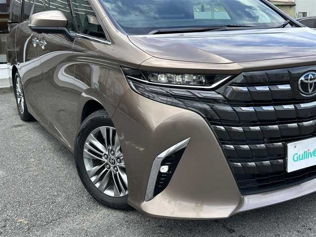 トヨタ アルファードハイブリット Z 三重県 2024(令6)年 3.6万km ゴールド ワンオーナー/ムーンルーフ/♪トヨタセーフティセンス/　・プリクラッシュセーフティシステム(PCS)/　・レーダークルーズコントロール/　・プロアクティブドライビングアシスト( PDA)/　・レーントテーシングアシスト( LTA)/   ・レーンディパーチャーアラート(LDA)/　・ブラインドスポットモニター(BSM)/　・ドライブスタートコントロール/♪純正メーカー14インチディスプレイナビ/　・フルセグ・Bluetooth・USB/　・MiraCast・HDMI/♪純正13.2インチ有機EL後席ディスプレイ/♪パノラミックビューモニター/♪純正デジタルインナーミラー/♪純正ドライブレコーダー(前後・360°)/♪前席・後席パワーシート(D席メモリ機能付き)/♪前席・後席(シートヒーター・ベンチレーション)/♪スマートキーx2/♪プッシュスタート/♪両側パワースライドドア/♪パワーバックドア/♪クリアランスソナー/♪三眼 LEDヘッドライト/♪LEDフォグライト/♪オートハイビーム/♪オートブレーキホールド/♪オートリトラクタブルミラー/♪後席電動オットマン/♪後席電動サンシェード/♪AC100V/♪ビルトインETC2.0/♪フロアマット/♪ドアバイザー