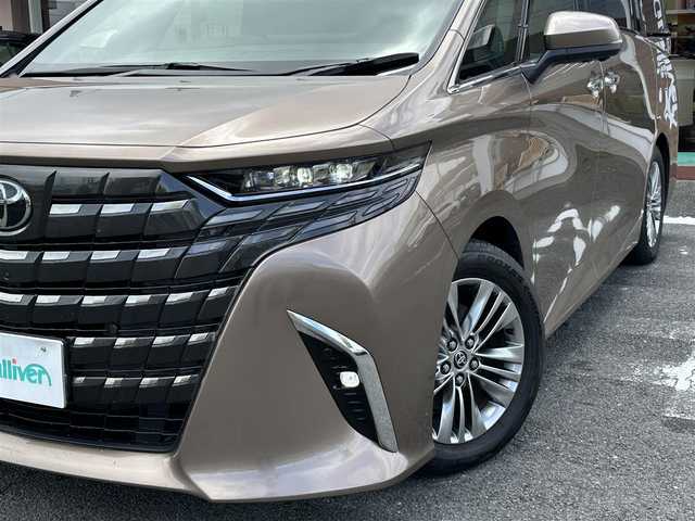トヨタ アルファードハイブリット Z 三重県 2024(令6)年 3.6万km ゴールド ワンオーナー/ムーンルーフ/♪トヨタセーフティセンス/　・プリクラッシュセーフティシステム(PCS)/　・レーダークルーズコントロール/　・プロアクティブドライビングアシスト( PDA)/　・レーントテーシングアシスト( LTA)/   ・レーンディパーチャーアラート(LDA)/　・ブラインドスポットモニター(BSM)/　・ドライブスタートコントロール/♪純正メーカー14インチディスプレイナビ/　・フルセグ・Bluetooth・USB/　・MiraCast・HDMI/♪純正13.2インチ有機EL後席ディスプレイ/♪パノラミックビューモニター/♪純正デジタルインナーミラー/♪純正ドライブレコーダー(前後・360°)/♪前席・後席パワーシート(D席メモリ機能付き)/♪前席・後席(シートヒーター・ベンチレーション)/♪スマートキーx2/♪プッシュスタート/♪両側パワースライドドア/♪パワーバックドア/♪クリアランスソナー/♪三眼 LEDヘッドライト/♪LEDフォグライト/♪オートハイビーム/♪オートブレーキホールド/♪オートリトラクタブルミラー/♪後席電動オットマン/♪後席電動サンシェード/♪AC100V/♪ビルトインETC2.0/♪フロアマット/♪ドアバイザー