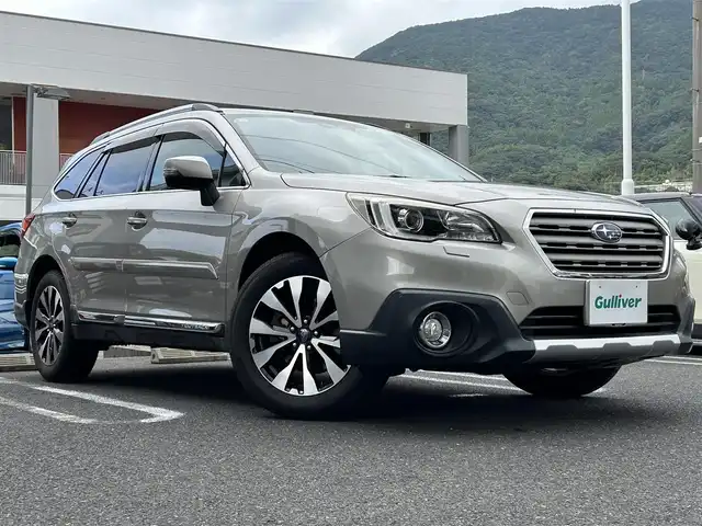 スバル アウトバック リミテッド 長崎県 2015(平27)年 11.3万km タングステンM Panasonic製ナビ　CN‐LR800D/（フルセグ、CD、DVD、AM、FM、BTオーディオ、HDMI）/バックカメラ/プッシュスタート/ステアリングリモコン/パドルシフト/追従クルーズコントロール/レーンアシスト/アイサイト/先行車発進お知らせ機能/X－MODE/電動リアゲート/リアゲートメモリー/ヘッドライトレベライザー/レザーシート/全席シートヒーター/DN席パワーシート/D席シートメモリー/電格ウィンカーミラー/オールオートパワーウィンドウ/ETC/電動パーキング/純正フロアマット/社外ドラレコ/ルーフレール/リヤデフォッガー/新車時保証書/車両取扱説明書/ナビ取扱説明書/スペアキー