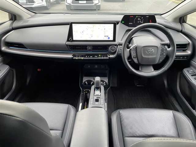 トヨタ プリウス Z 広島県 2023(令5)年 6.6万km アティチュードブラックマイカ 〇12.3インチディスプレイオーディオ/〇フルセグTV/〇パワーバックドア/〇バックカメラ/〇パノラマビューモニター/〇ビルトインETC2.0/〇レーダークルーズコントロール/〇コーナーセンサー/〇セーフティセンス/〇トヨタチームメイト/〇LEDヘッドランプ/〇LEDアクセサリーランプ/〇デジタルインナーミラー/〇合皮巻きステアリングホイール/〇ステアリングヒーター/〇合皮スポーティシート/〇パワーシート/シートヒーター/〇シートベンチレーション/〇純正19インチアルミホイール/〇スマートエントリー/スタートシステム/〇禁煙車