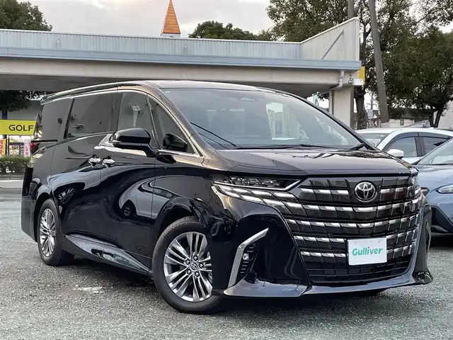 トヨタ アルファードハイブリット Z 熊本県 2025(令7)年 0.1千km ブラック 左右独立型ムーンルーフ/革シート/ワンオーナー/純正ナビ/全方位カメラ/ビルトインETC/純正フリップダウンモニター（V13T-R72F）/純正18インチAW/レーダークルーズ/両側パワースライドドア/パワーバックドア/オートサイドステップ/1列目・2列目パワーシート/1列目・2列目シートヒーター・エアーシート/ステアリングヒーター/LEDヘッドライト/オートライト/前後コーナーセンサー/横滑り防止装置/ウィンカーミラー/新車保証書/取扱説明書/スマートスペアキー×1本