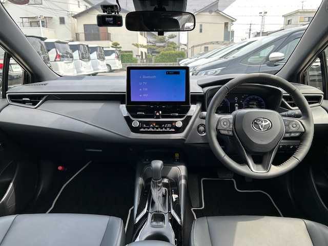トヨタ カローラツーリング ハイブリッド ダブルバイビー 大阪府 2025(令7)年 0.3万km アティチュードブラックマイカ 10.5インチナビ/バックカメラ/レーンキープアシスト/横滑り防止機能/盗難防止装置/コーナーセンサー（前後）/衝突軽減システム/クルーズコントロール（追従横行有）/シートヒーター/ドライブレコーダー（前後）/オートライト/オートマチックハイビーム/純正アルミホイール/純正フロアマット/ステリングヒーター/ビルトインETC/スマートキー（2本）