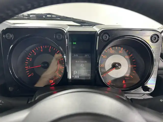 スズキ ジムニー XC 佐賀県 2023(令5)年 2.1万km ミディアムグレー 純正8型ナビ/（ＡＭ/ＦＭ/CD/DVD/Bluetooth/フルセグTV）/バックカメラ/クルーズコントロール/前後ドライブレコーダー/衝突被害軽減システム/レーンアシスト/コーナーセンサー/シートヒーター/ビルトインETC/LEDヘッドライト/オートエアコン/盗難防止装置/横滑り防止装置/車線逸脱警報/ダウンヒルアシストコントロール/センターデフロック/オートライト/オートマチックハイビーム/スマートキー/スペアキー有/プッシュスタート/純正フロアマット/純正16インチアルミホイール	/ステアリングスイッチ/電動格納ミラー