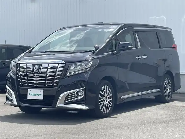 トヨタ アルファード SA Cパッケージ 愛媛県 2016(平28)年 5万km スパークリングブラックパールクリスタルシャイン トヨタセーフティセンス/プリクラッシュセーフティ/レーダークルーズコントトール/インテリジェントクリアランスソナー/ALPINE11インチナビ【EX11】/　CD/DVD/Bluetooth/フルセグTV/HDMI/バックカメラ/ALPINE12.8型フリップダウンモニター/両側パワースライドドア/パワーバックドア/ルームミラー型ドライブレコーダー/ウッドコンビステアリング/ステアリングヒーター/オートライト/LEDヘッドライト/ビルトインETC/純正18インチAW/オート電動格納ミラー/プッシュスタート/オットマン/フロアマット/リアサンシェード