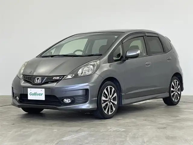 ホンダ フィット RS 群馬県 2013(平25)年 7.3万km ポリッシュドメタルメタリック 純正HDDナビ　バックカメラ　寒冷地仕様　ＨＩＤライト　オートライト　純正１６インチＡＷ　ステアリングリモコン　パドルシフト　横滑り防止装置　スマートキー　ＥＴＣ　ドライブレコーダー　禁煙車