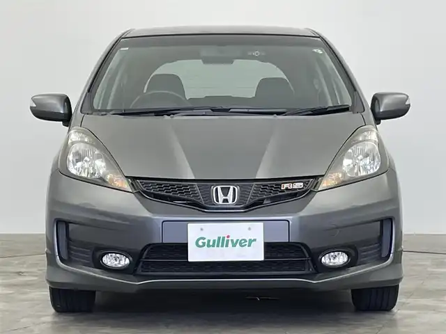 ホンダ フィット RS 群馬県 2013(平25)年 7.3万km ポリッシュドメタルメタリック 純正HDDナビ　バックカメラ　寒冷地仕様　ＨＩＤライト　オートライト　純正１６インチＡＷ　ステアリングリモコン　パドルシフト　横滑り防止装置　スマートキー　ＥＴＣ　ドライブレコーダー　禁煙車