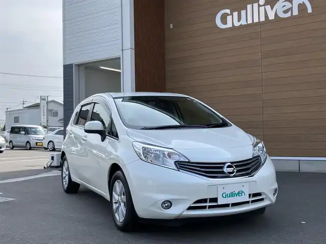 日産 ノート メダリスト 埼玉県 2013(平25)年 1.9万km ブリリアントホワイトパール 登録時18773km/ワンオーナー/スーパーチャージャー/純正SDナビ【MC312D-W】/　・アラウンドビューモニター/　・フルセグTV/　・CD/DVD再生/　・Bluetooth接続/　・USB/AUX端子/　・SDミュージックサーバー/黒ハーフレザーシート/革巻きステアリング/純正15インチAW/アイドリングストップ/インテリジェントキー×2/プッシュスタートボタン/電動格納ミラー/ドアバイザー/フォグランプ/ETC/保証書/取扱説明書/ナビ取扱説明書/日産ディーラー整備記録簿/（H26.H28.H29.H30.H31.R2.R3.R4.R5.R6.R7）/