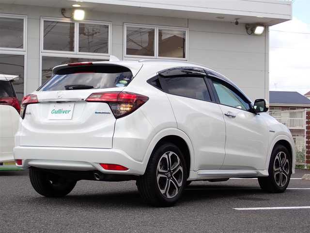ホンダ ヴェゼル ハイブリッド Z ホンダセンシング 千葉県 2020(令2)年 3.6万km パール ワンオーナー/純正8インチSDナビ/・CD/DVD再生/・CD録音/・Blue tooth/・フルセグTV/バックカメラ/ビルトインETC/ナビ連動ドライブレコーダー/ハーフレザー/シートヒーター/Honda SENSING/コンフォートビューパッケージ/ルーフレール/LEDヘッドライト/LEDフォグランプ/プッシュスタート/スマートキー2本/サイド/カーテンエアバッグ/保証書/取扱説明書/