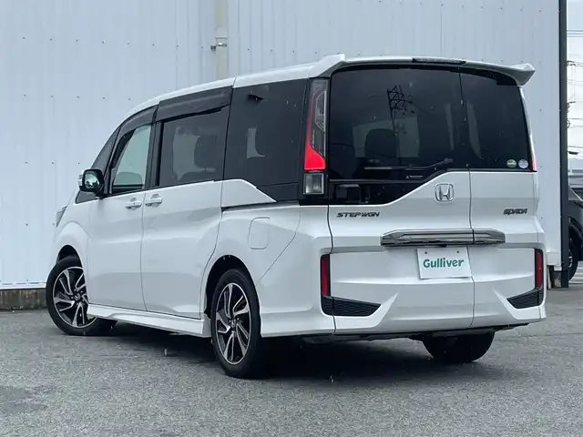 ホンダ ステップワゴン スパーダ クルスピセンシング 福岡県 2020(令2)年 2.6万km プラチナホワイトパール ホンダセンシング/衝突軽減/レーンアシスト/純正11.6インチフリップダウンモニター/純正９インチナビ（ＶＸＭ－２０７ＶＦＮｉ）/フルセグTV/CD/DVD/BT/applecarplay/バックカメラ/両側パワースライドドア/ハーフレザー/シートヒーター/レーダークルーズコントロール/パドルシフト/ETC2.0/オートライト/アイドリングストップ/わくわくゲート/オートライト/エンジンスターター