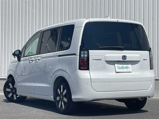 ホンダ フリード ハイブリット e:HEV AIR EX 東京都 2025(令7)年 0.1万km パール ワンオーナー/ホンダセンシング/・衝突軽減ブレーキ/・踏み間違い衝突軽減システム/・急アクセル抑制機能/・路外逸脱抑制機能/・歩行者事故低減ステアリング/・先行車発進お知らせ機能/・標識認識機能/・ブラインドスポットインフォメーション/・オートハイビーム/・アダプティブドライビングビーム/・パーキングセンサーシステム/ホンダディスプレイオーディオ/（BT/USB/HDMI/AppleCarPlay/AndoroidAuto）/バックカメラ/ETC/ハーフレザー/シートヒーター（D席/N席）/両側パワースライドドア/ドライブレコーダー/3列シート/LEDヘッドライト/保証書/取扱説明書/スペアキー
