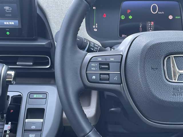 ホンダ フリード ハイブリット e:HEV AIR EX 東京都 2025(令7)年 0.1万km パール ワンオーナー/ホンダセンシング/・衝突軽減ブレーキ/・踏み間違い衝突軽減システム/・急アクセル抑制機能/・路外逸脱抑制機能/・歩行者事故低減ステアリング/・先行車発進お知らせ機能/・標識認識機能/・ブラインドスポットインフォメーション/・オートハイビーム/・アダプティブドライビングビーム/・パーキングセンサーシステム/ホンダディスプレイオーディオ/（BT/USB/HDMI/AppleCarPlay/AndoroidAuto）/バックカメラ/ETC/ハーフレザー/シートヒーター（D席/N席）/両側パワースライドドア/ドライブレコーダー/3列シート/LEDヘッドライト/保証書/取扱説明書/スペアキー