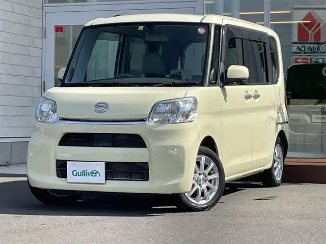 ダイハツ タント X 道央・札幌 2014(平26)年 6.3万km コットンアイボリー ・4WD/・社外ナビ（CD&DVD&BT&フルセグ）/・後席社外モニター/・純正フロアマット/・片側パワースライドドア/・アイドリングストップ/・社外AW/・社外AW付きスタッドレスタイヤ/・スマートキー/・ドライブレコーダー/・ベンチシート/・フルフラットシート/・オートライト