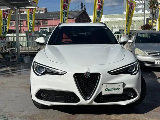 アルファロメオ ステルヴィオ 2.2ターボ ディーゼルQ4 スポーツPKG 京都府 2020(令2)年 3.4万km 白 ワンオーナー/33321キロ/ドライブレコーダー前後/ETC/メモリーナビ/バックカメラ/フルセグTV/ハーマンカードン/レーダークルーズ/メモリーシート123/シートヒーター/ステアリングヒーター/LEDヘットライト/USB/コーナーセンサー/保証書/説明書